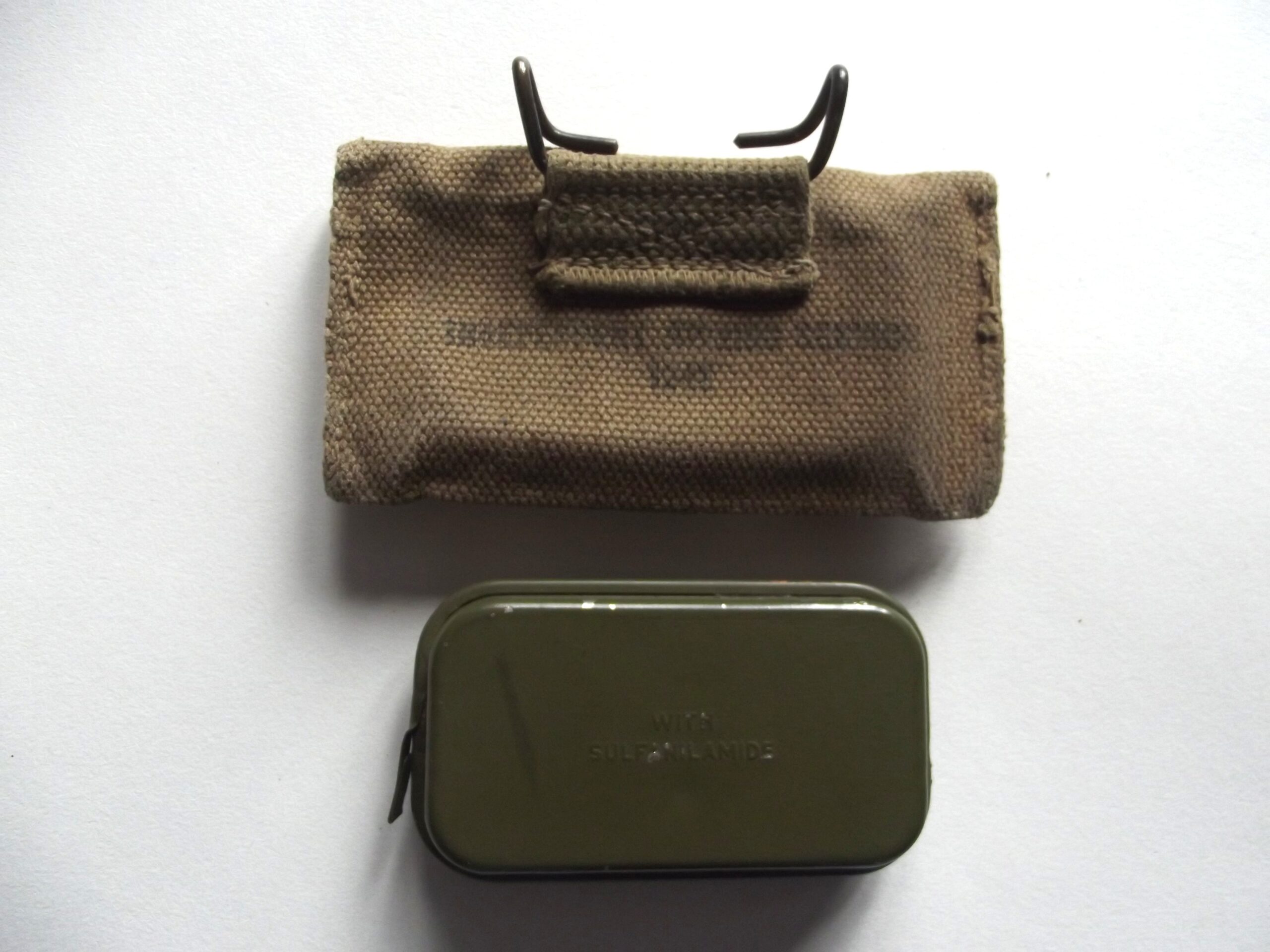 WW2 AMERICAN M1924 FIRST AID WEBBING POUCH & CARLILSE TIN DATED 1942