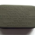 WW2 AMERICAN FIRST AID CARLISLE MODEL TIN SEALED