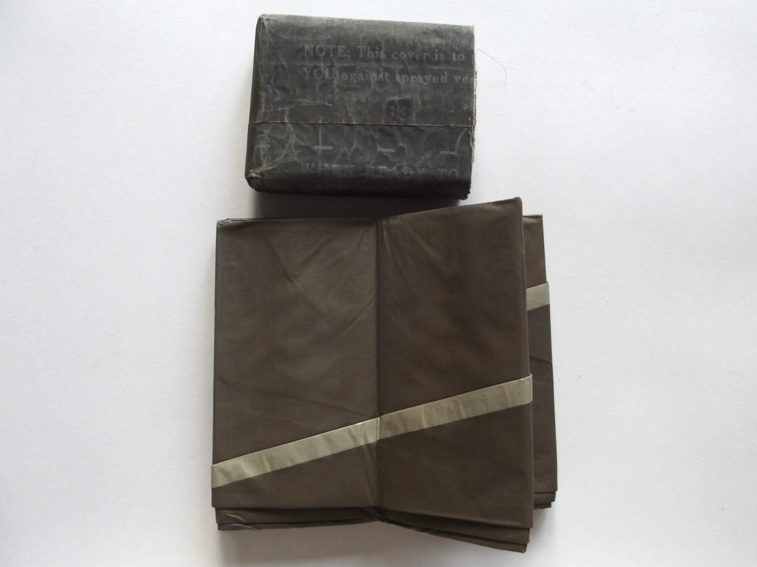 WW2 AMERICAN CHEMICAL WARFARE PROTECTIVE COVER DATED 1944